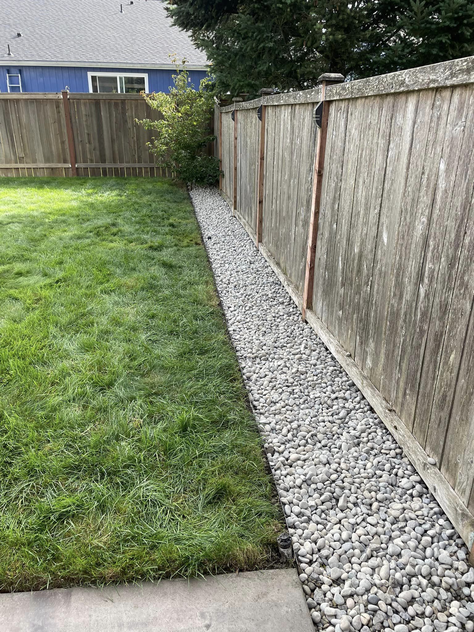 Under fence edging ideas